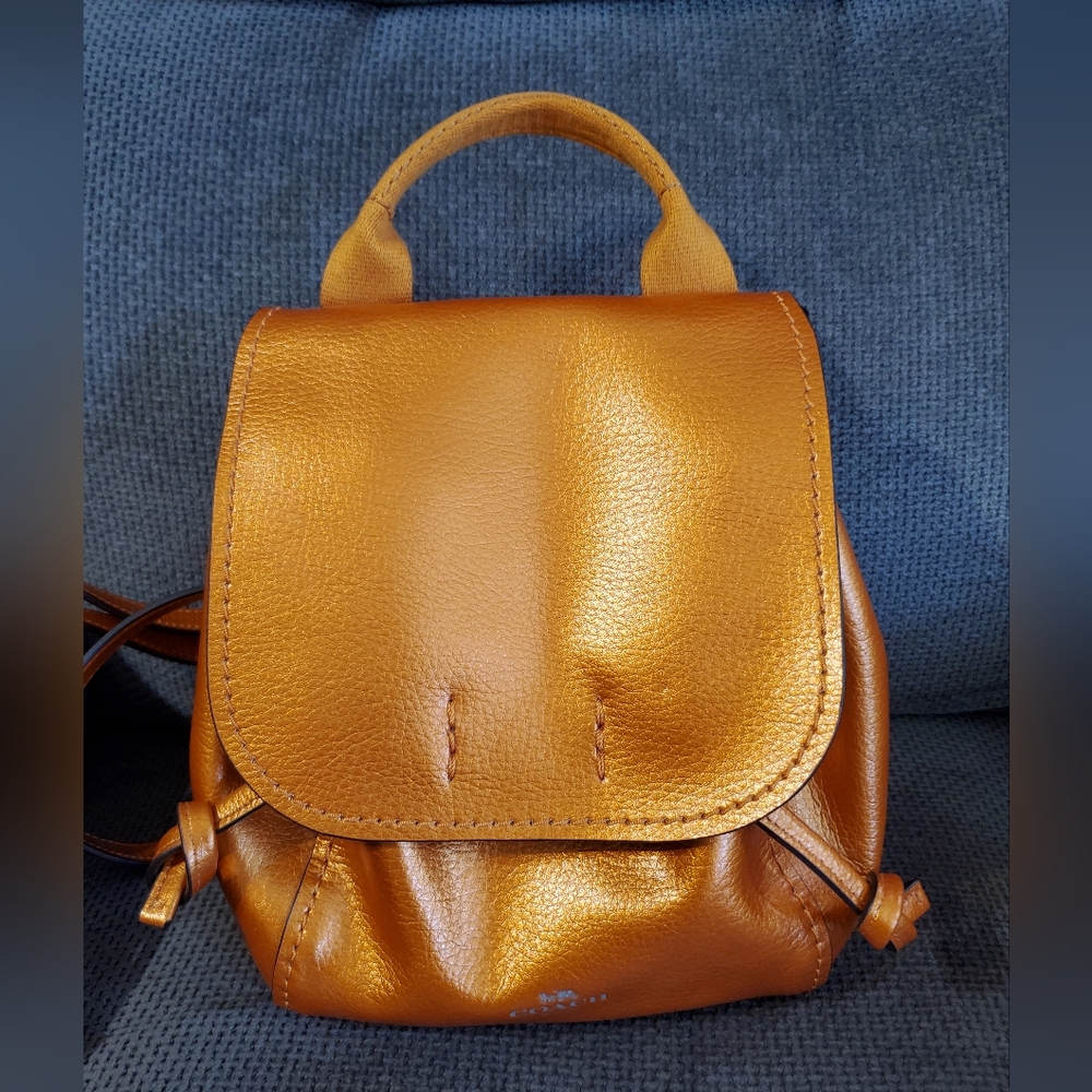 Coach Derby Metallic Tangerine Pebbled Coated Leather Backpack